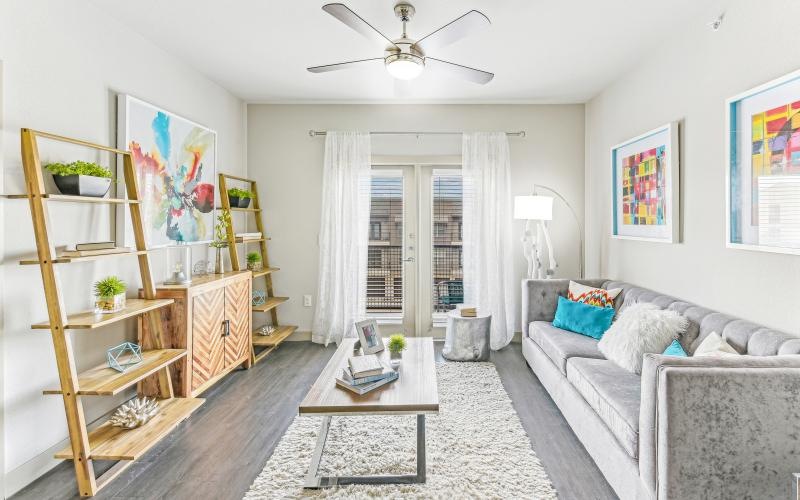 a living room with a couch and a table